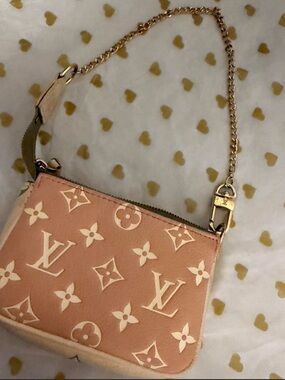 Louis Vuitton Empriente Monogram Giant by the Pool Mini Pochette